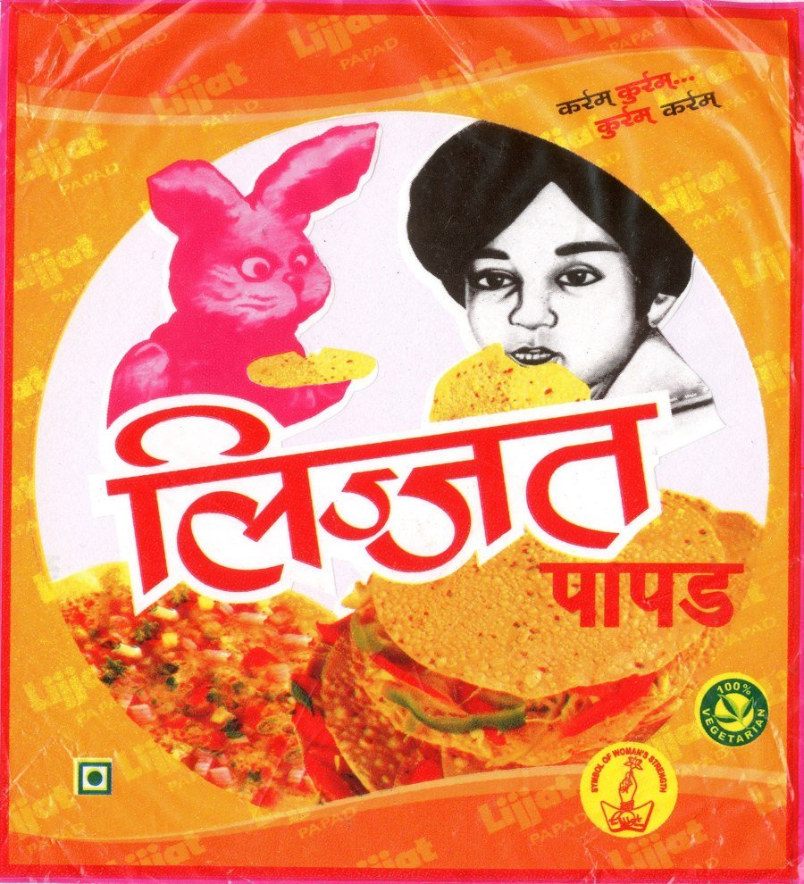 A Lijjat Papad packet with the brand name in Hindi and an illustration of a rabbit and a woman